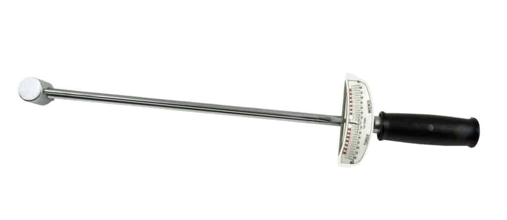 A beam type torque wrench has a torque gauge near the handle.